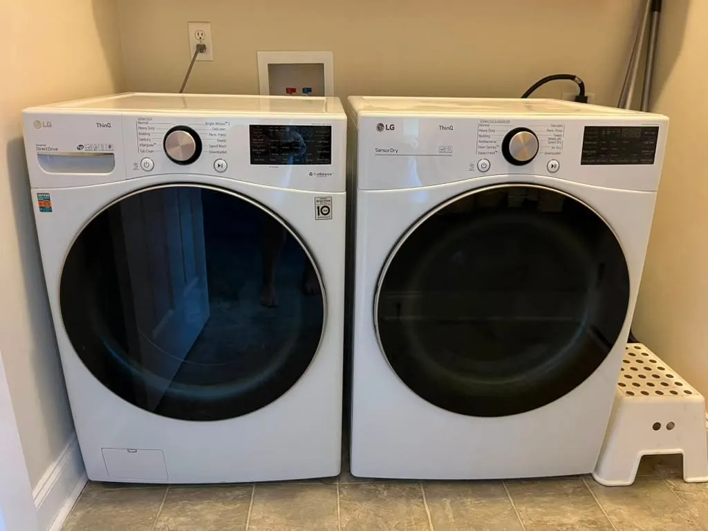 Newly installed front-load washer and dryer set in a Wilmington, NC home