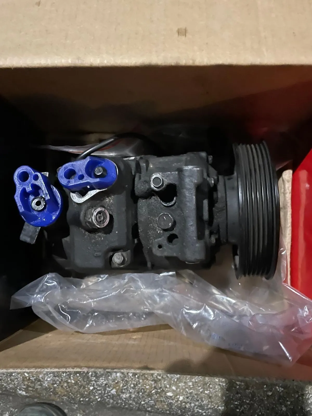 Replacement A/C compressor ready to be fitted