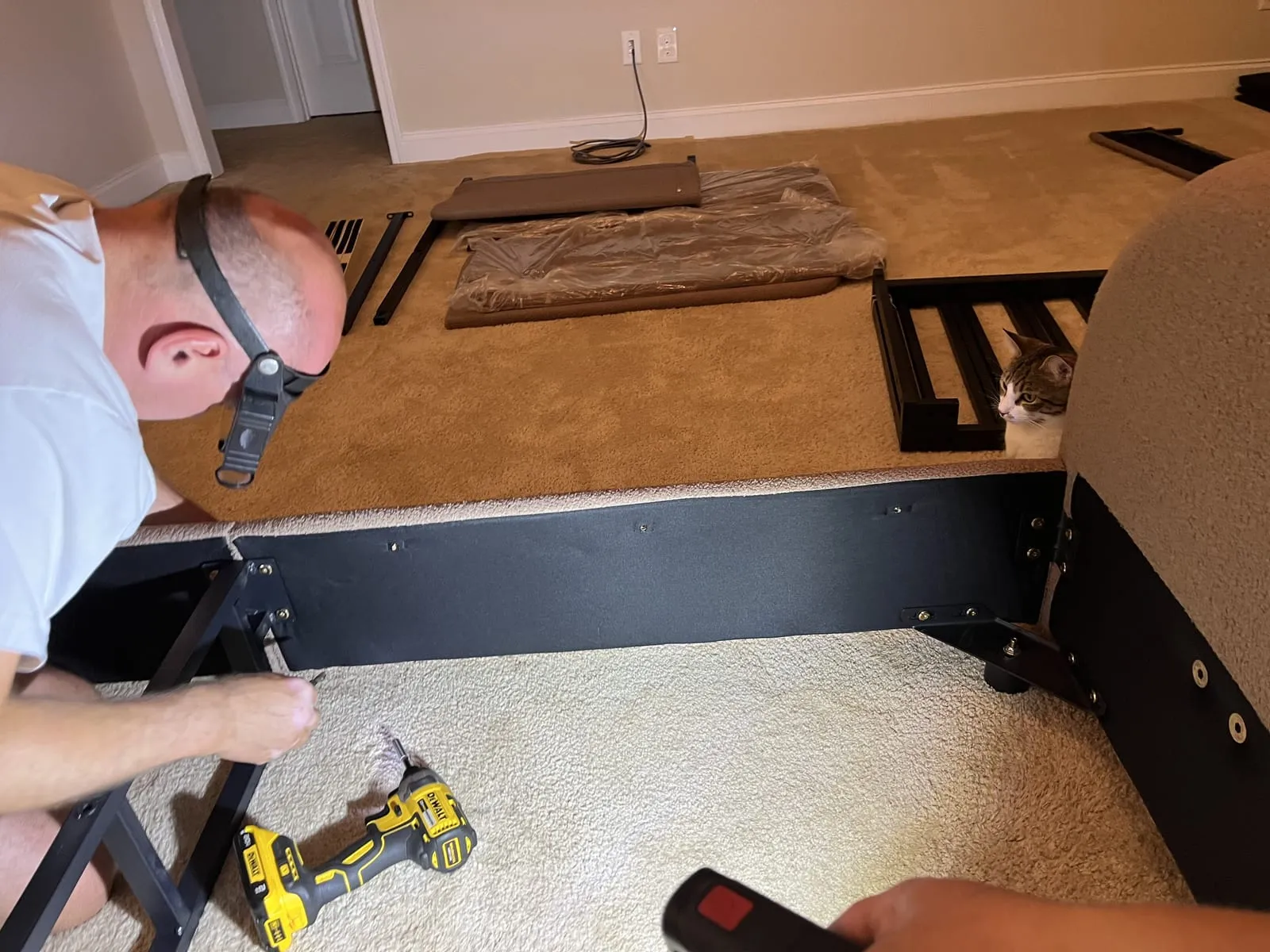 Assembling the sofa frame with a cordless drill