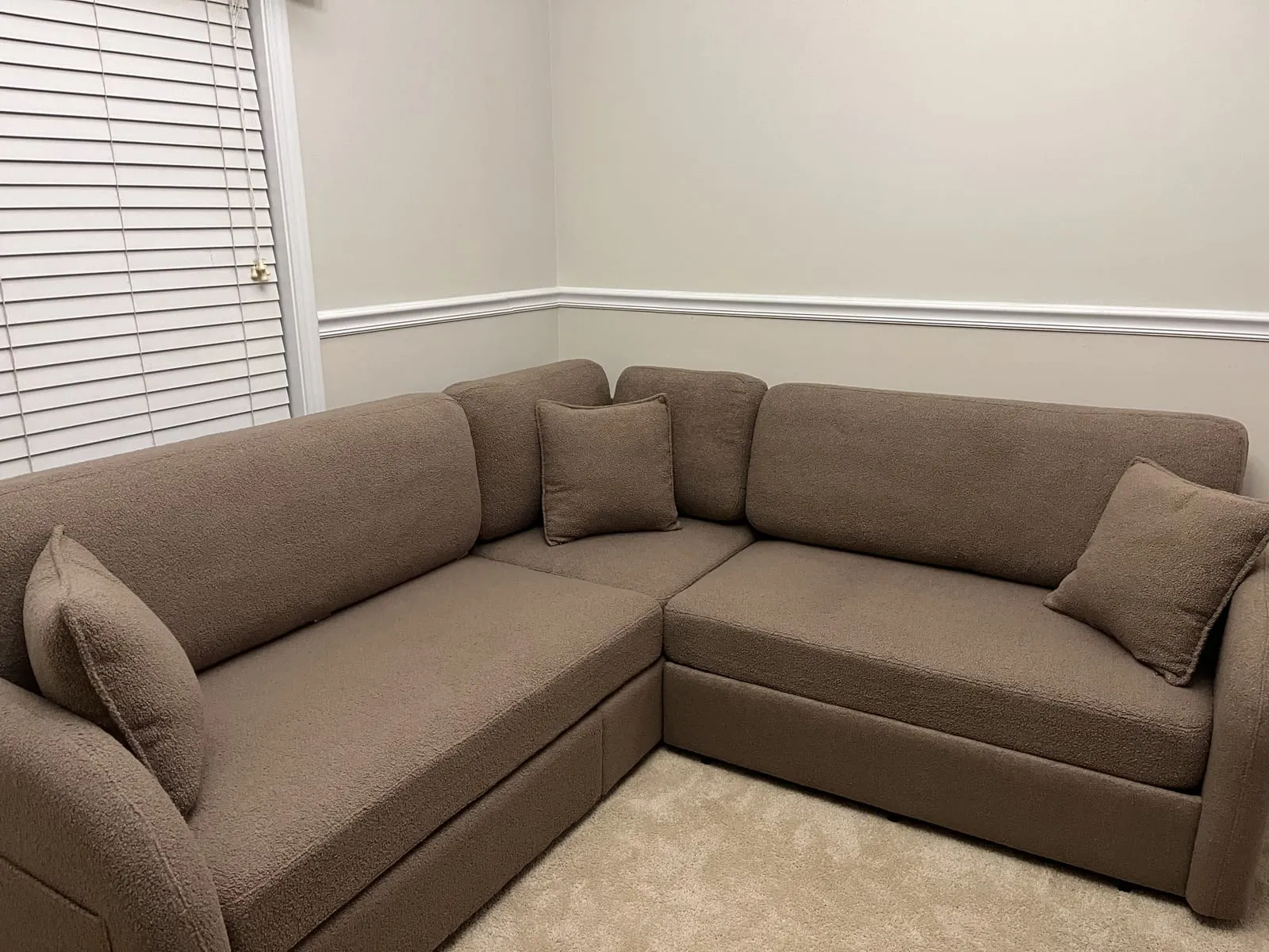 Finished sectional sofa seen from the other side of the room