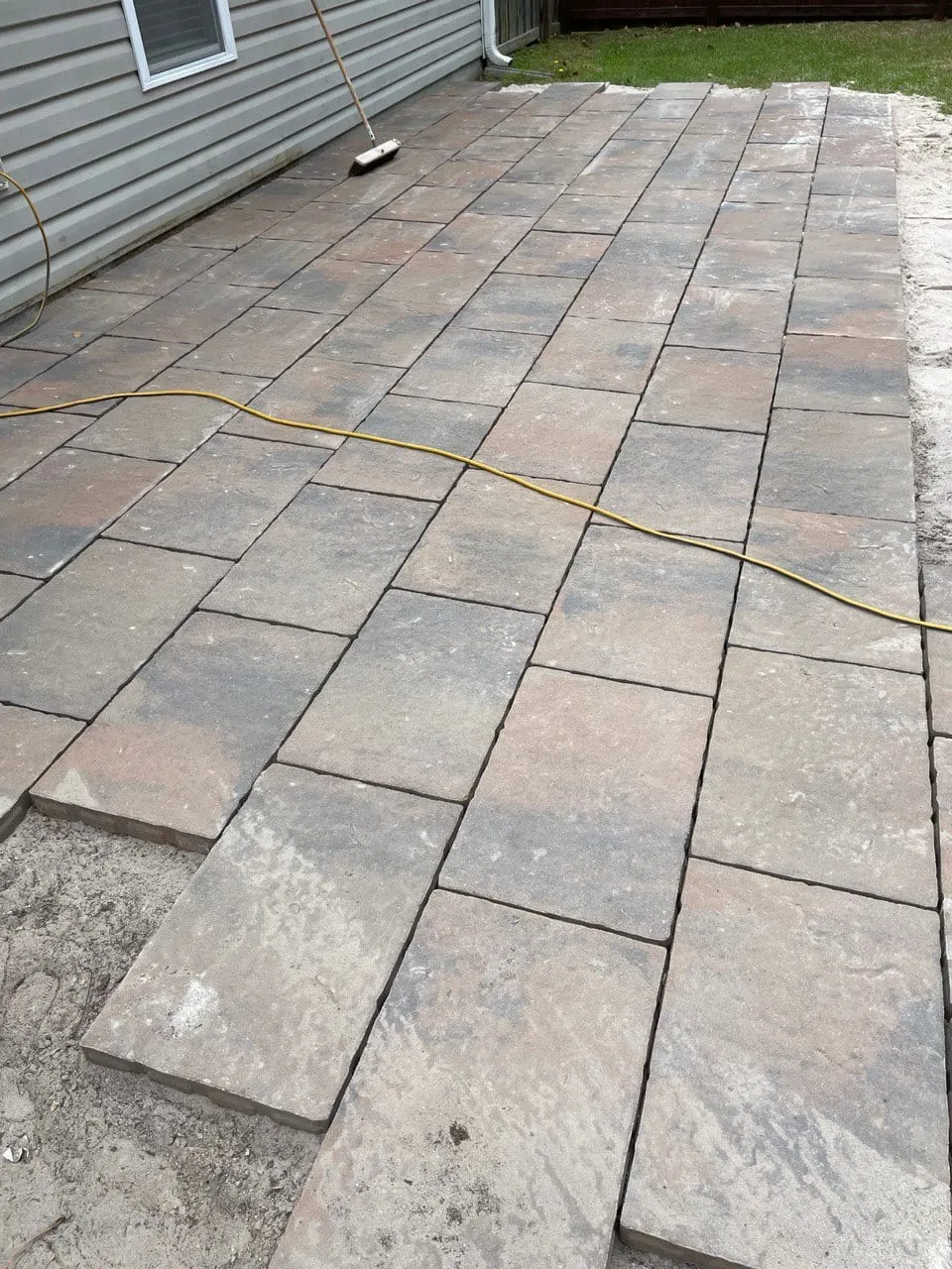 Close-up of the laid paver pattern showing level, even joints